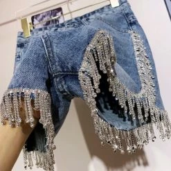 ReveBoutique Jessica Bara Jorjina High Waisted Rhinestone Tassel Denim Shorts