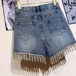 ReveBoutique Jessica Bara Jorjina High Waisted Rhinestone Tassel Denim Shorts