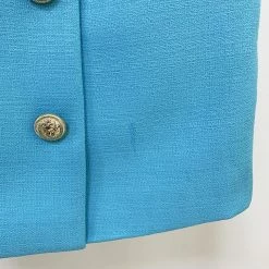 The 9-5 Shop Jessica Bara Lucia Gold Button Mini Skirt