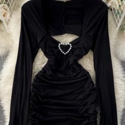 Summer Lovin' Jessica Bara Liam Long Sleeve Cut Out Mini Dress