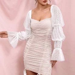 Summer Lovin' Jessica Bara Sebastian Long Sleeve Polka Dot Mini Dress